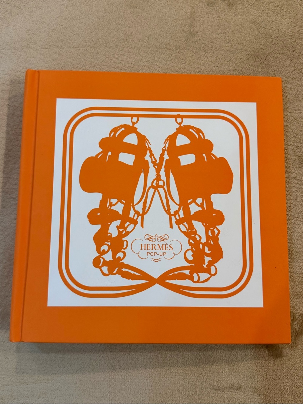 HERMES pop up hardcover book with iconic silk scarf designs